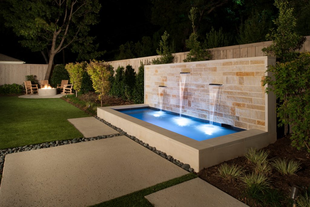 Small minimalist backyard concrete paver and rectangular hot tub photo in Dallas
