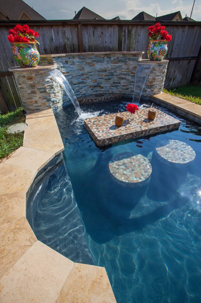 Small minimalist backyard tile and custom-shaped pool fountain photo in Houston