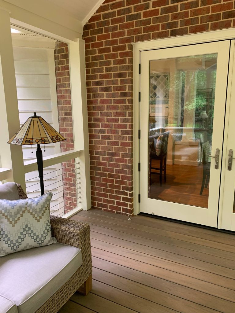 Small minimalist screened-in side porch photo in Raleigh by Build Moore | Outdoor Photos | Porch | Landscaping | Landscape Design | Outdoor Living Space | Porch Design Ideas | Outdoor Living Space Ideas | Backyard Design