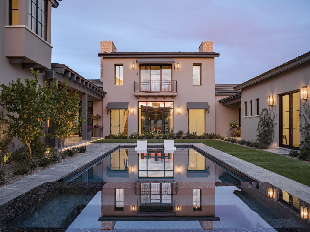 Small southwest courtyard tile and rectangular lap pool photo in Phoenix
