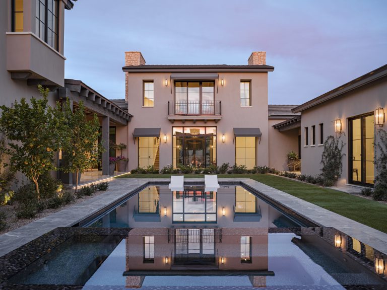 Small southwest courtyard tile and rectangular lap pool photo in Phoenix