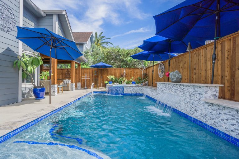 Small space, but big impact in this gorgeous custom pool & spa combo!