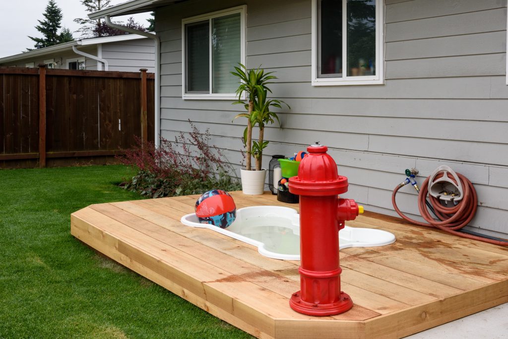 Small transitional backyard outdoor shower deck photo in Seattle with no cover