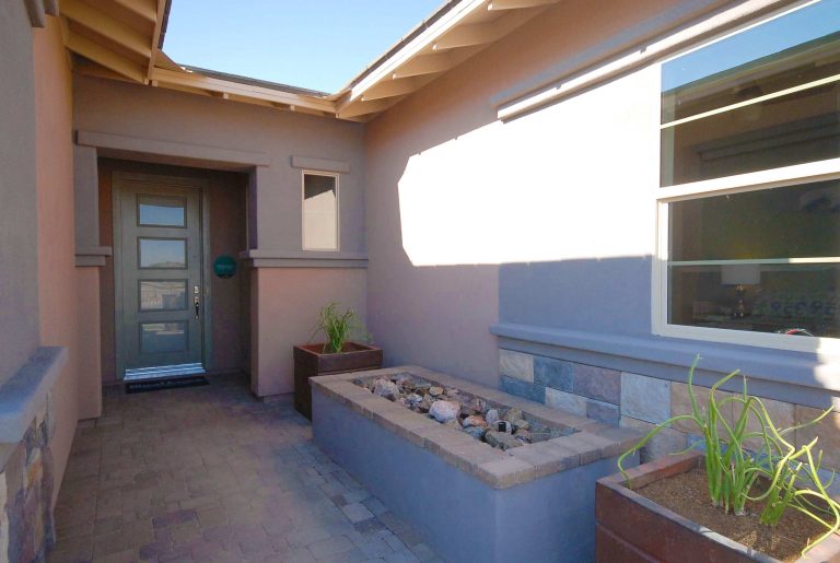 Small trendy brick porch photo in Phoenix by Shea Homes - Arizona | Outdoor Photos | Porch | Landscaping | Landscape Design | Outdoor Living Space | Porch Design Ideas | Outdoor Living Space Ideas | Backyard Design