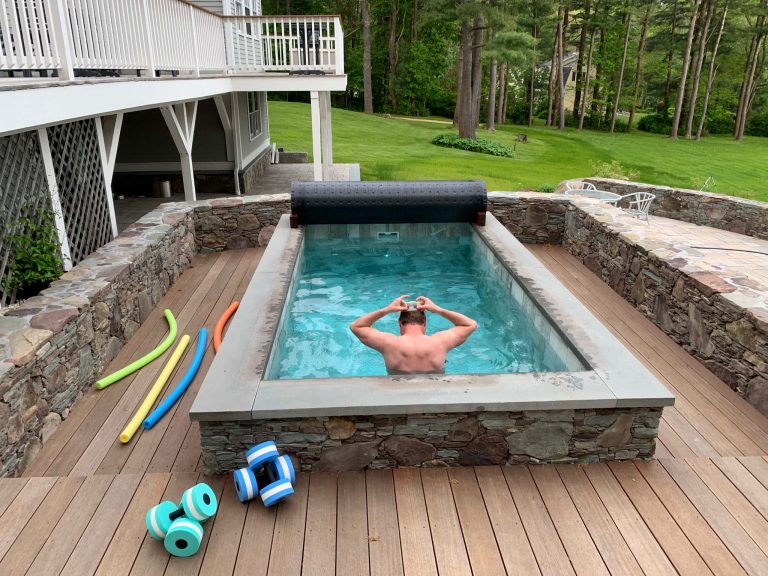 Soake Pool in a private backyard setting. Interesting and beautiful mix of materials and texture was used on wood deck and stone surround.