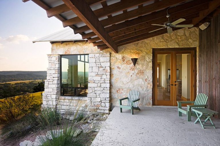 Southwest porch photo in Austin with a roof extension by Burleson Design Group | Outdoor Photos | Porch | Landscaping | Landscape Design | Outdoor Living Space | Porch Design Ideas | Outdoor Living Space Ideas | Backyard Design