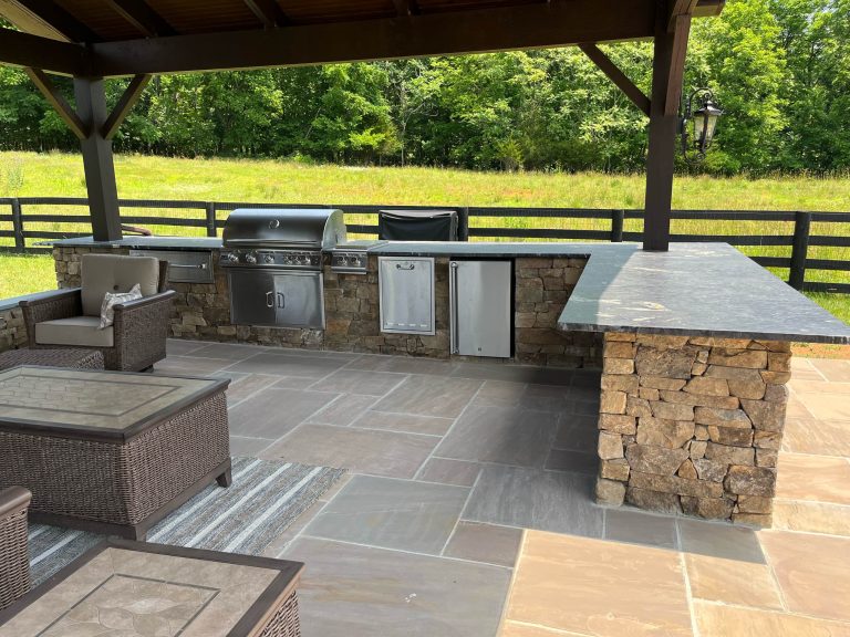 Stone outdoor kitchen porch photo in DC Metro