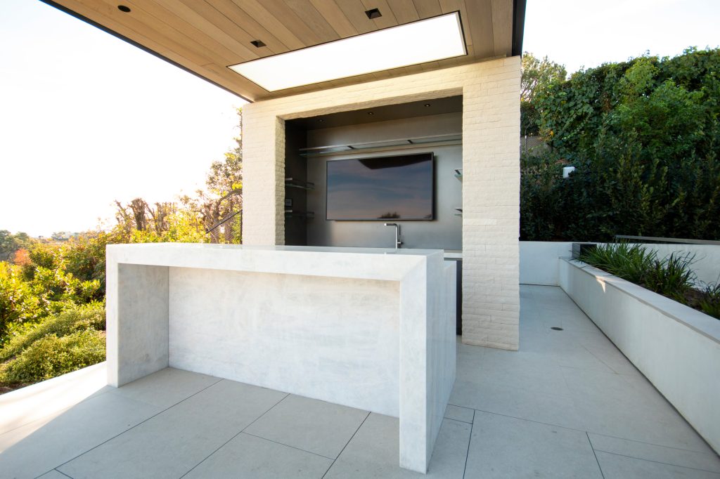 Stone patio kitchen photo in Los Angeles