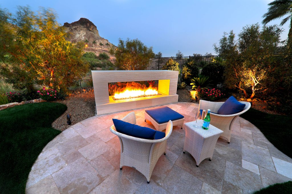 Stunning 4 sided Infinity Pool Spa, all black tile, travertine decking, firepit & fireplace! Turf strips to soften the space and views that go on forever!