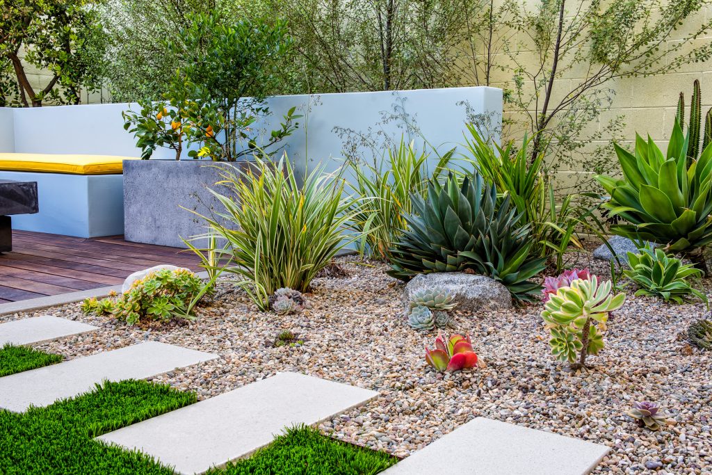 Succulents and agave's in decorative pebble near an ipe wood deck with built-in seating an a prefabricated fire pit by restoration hardware.

Studio H Landscape Architecture by Studio H Landscape Architecture | Backyard Design | Outdoor Living Spaces | Landscape Design | Backyard Ideas | Landscaping | Landscaping Ideas | Landscape Installation