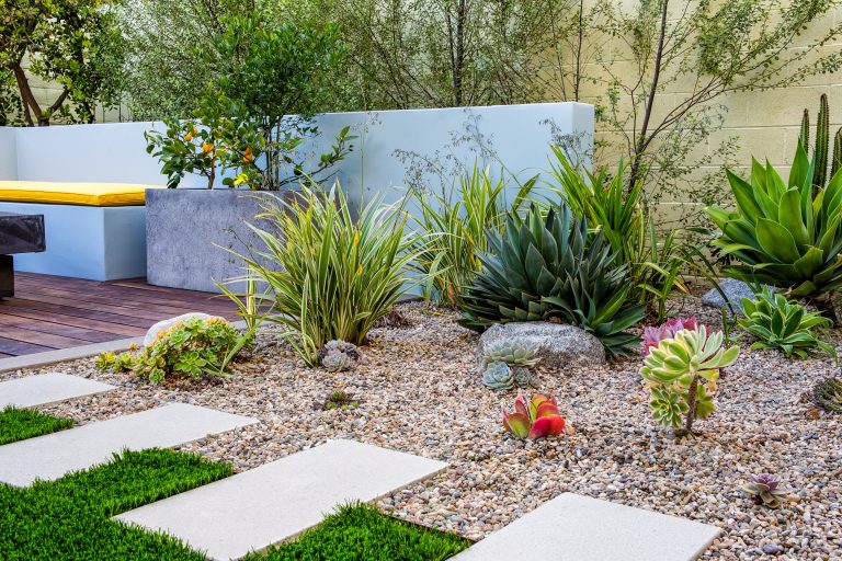 Succulents and agave's in decorative pebble near an ipe wood deck with built-in seating an a prefabricated fire pit by restoration hardware.

Studio H Landscape Architecture by Studio H Landscape Architecture | Backyard Design | Outdoor Living Spaces | Landscape Design | Backyard Ideas | Landscaping | Landscaping Ideas | Landscape Installation