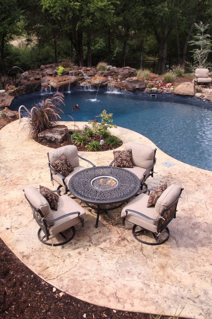 Summerset chat set, vinyl liner salt water pool, stamped & stained concrete pool decking