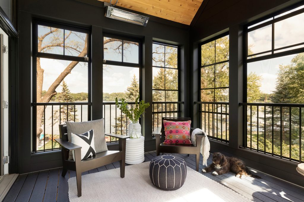 Sunroom with wood ceiling detail.