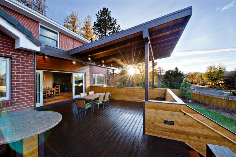 Sunset view of the newly constructed outdoor living room. Tony Gallagher PhotographyThis is an example of a modern porch design in Denver. by BcDc (B. Costello Design & Consulting, LLC) | Outdoor Photos | Porch | Landscaping | Landscape Design | Outdoor Living Space | Porch Design Ideas | Outdoor Living Space Ideas | Backyard Design