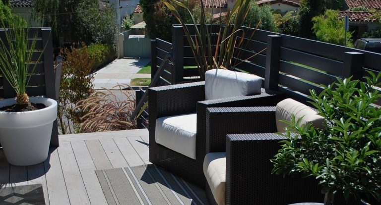 TREX deck and privacy screen shield home from street. Photo by Katrina Coombs