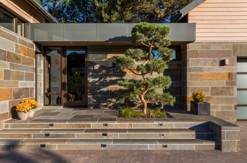 The Fulton Weeping Hindu Pan Pine (quite a mouthful for such a little tree) on the front porch brings the green of the garden right up to the front door. Photo Credit: Paul Crosby by Sarah Nettleton Architects | Outdoor Photos | Porch | Landscaping | Landscape Design | Outdoor Living Space | Porch Design Ideas | Outdoor Living Space Ideas | Backyard Design