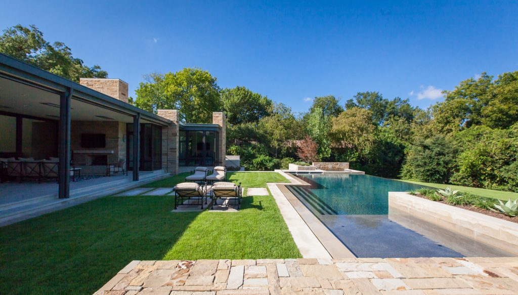 The Garden Design Studio designed the pool and all of the hardscape and plantings pictured, including the outdoor lighting.