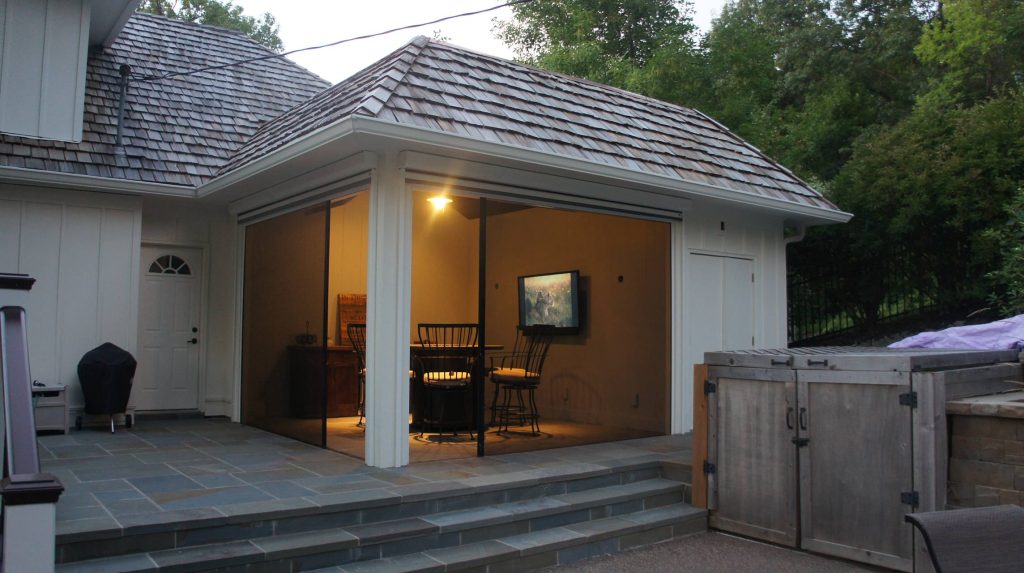 The Phantom screens feature both vertical and horizontal screens. This picture illustrates how the horizontal screens can be left open to allow easier entry or exit from the porch. by Appeal Architects | Outdoor Photos | Porch | Landscaping | Landscape Design | Outdoor Living Space | Porch Design Ideas | Outdoor Living Space Ideas | Backyard Design