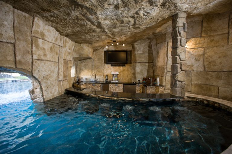 The bar has keg-orators, snow cone machines, fridges, sinks, and ice makers, and of course flat screen TV for the football games


Photography by Paul Ladd by Marquise Pools | Pool design | Pool Contracting | Swimming Pool Ideas | Swimming Pool Design Ideas