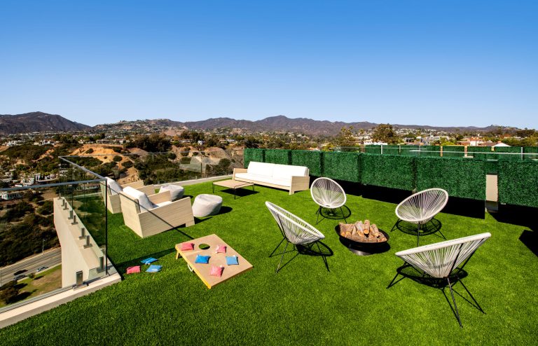 The below grade parking and rooftop pool / deck is a crucial space saver with the tight lots in Los Angeles.