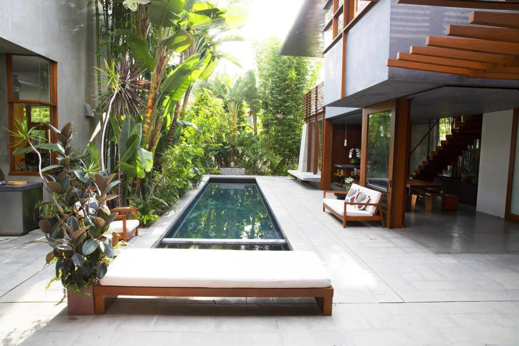 The courtyard features a tranquil atmosphere and family pool.