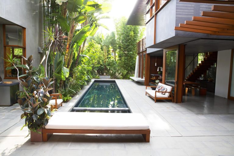 The courtyard features a tranquil atmosphere and family pool.