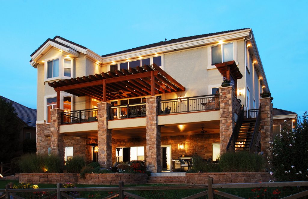 The custom railing is the perfect accent to this beautiful outdoor living space.