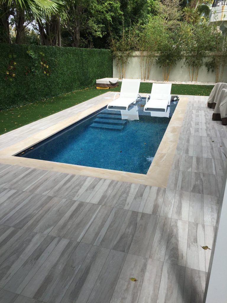 The existing pool was way too large for the space, it took up the entire back yard.