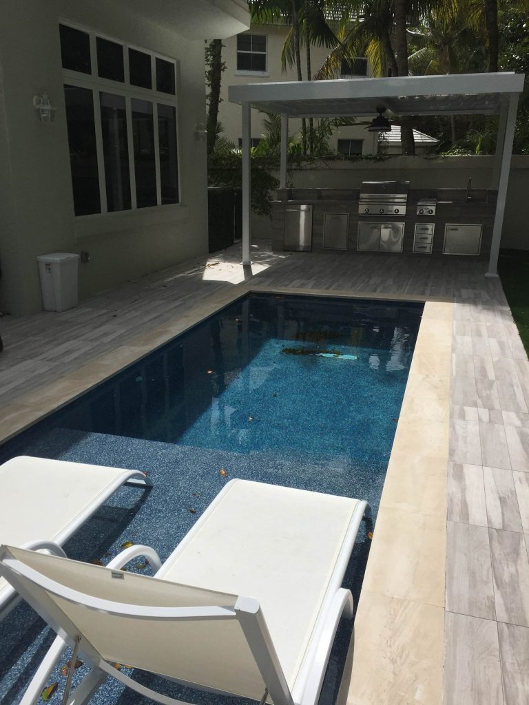 The existing pool was way too large for the space, it took up the entire back yard.