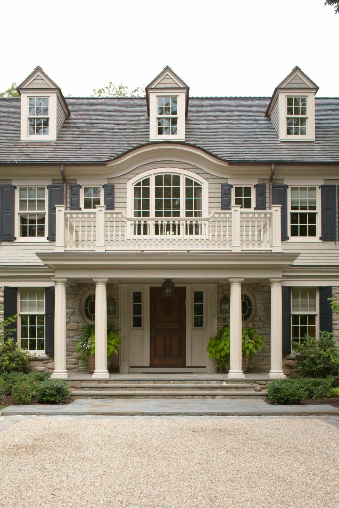 The eyebrow on the roof was used to soften yet distinguish the entrance. Photographer: Roger William Photography Landscape Architect: Glen Ticehurst
