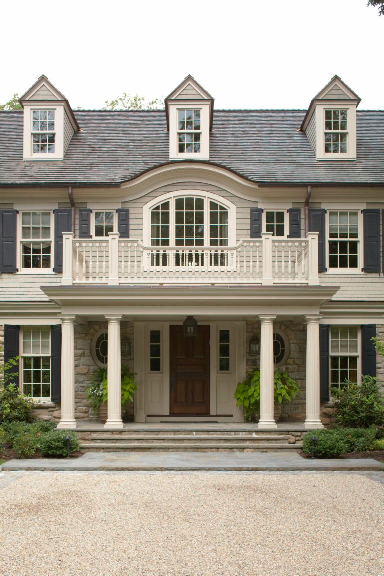 The eyebrow on the roof was used to soften yet distinguish the entrance. Photographer: Roger William Photography Landscape Architect: Glen Ticehurst