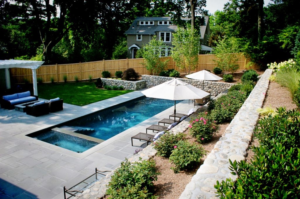 The fire pit is just steps from the pool, a welcoming spot to dry off after a late night swim.