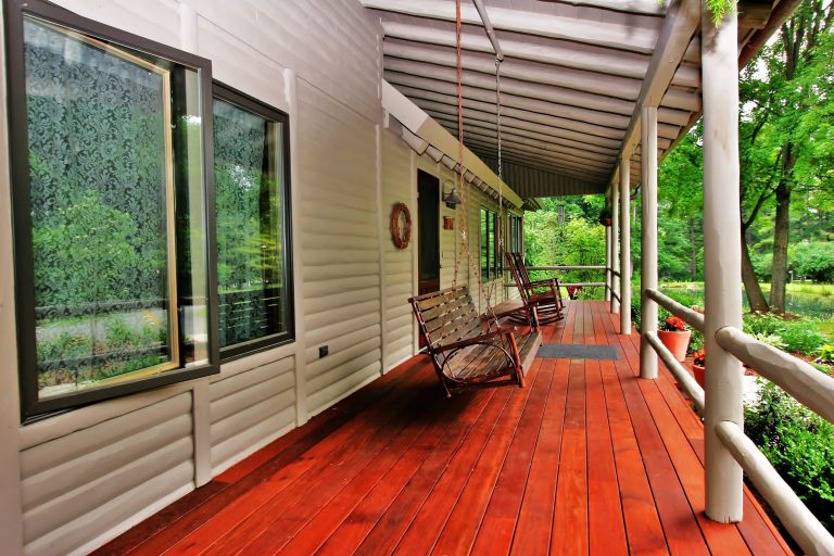 The front porch also recieved a huge upgrade when it was remodeled with Ipe hardwood