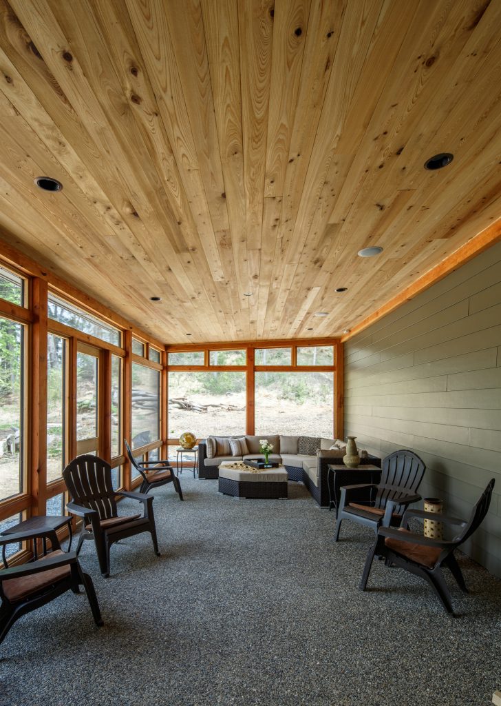 The house opens up to the screened-in porch bringing the outdoors inside. Photos by Steve Buchanan PhotographyMinimalist screened-in back porch photo in Philadelphia by Hugh Lofting Timber Framing, Inc. | Outdoor Photos | Porch | Landscaping | Landscape Design | Outdoor Living Space | Porch Design Ideas | Outdoor Living Space Ideas | Backyard Design