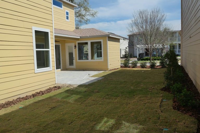 The large spacious yard and paver patio. There's plenty of space to set up a fire pit and some chairs on the patio and still have more than enough space to play in the yard! by Skobel Homes | Outdoor Photos | Porch | Landscaping | Landscape Design | Outdoor Living Space | Porch Design Ideas | Outdoor Living Space Ideas | Backyard Design