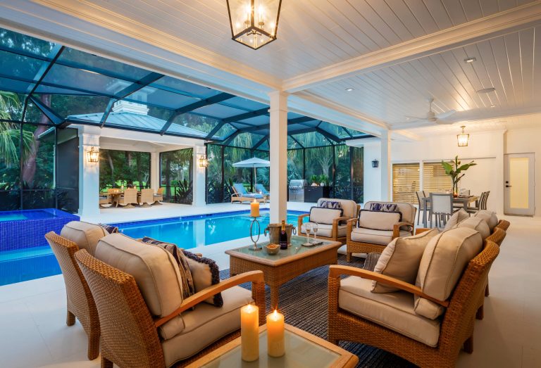 The loggia’s wide plank ceiling suggests Old Florida style.