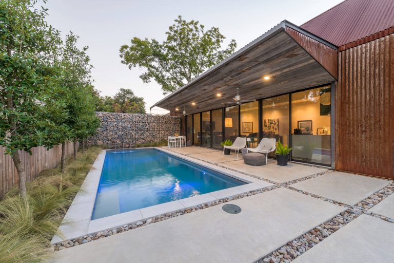 The minimalistic design of the pool compliments the basic shape of the house. Close attention was paid to the details of the pool and surrounding deck.

Photography Credit: Wade Griffith by AquaTerra Outdoors | Pool design | Pool Contracting | Swimming Pool Ideas | Swimming Pool Design Ideas