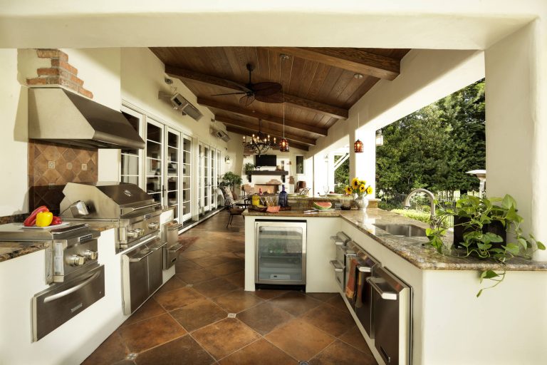 The outdoor kitchen provides exterior living and entertaining opportunities year round. Photo: Dave Adams