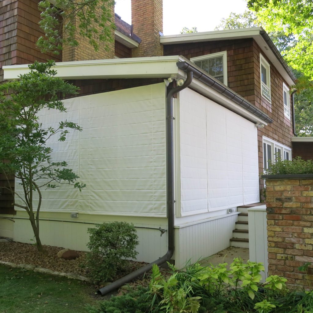 The outdoor shades are operated from inside the screen porch so there is no need to go outside in the wind and rain to close up your screen porch.