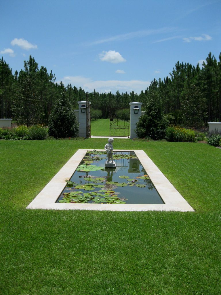 The owner wanted a similar aesthetic to a french formal garden implemented into the Florida landscape.
