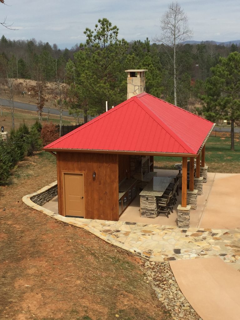 The perfect pool house. Has everything from storage, full bath with shower, fire place and bar.