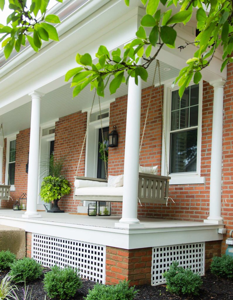 The porch-swing out front is giving us hints of cozy southern charm.