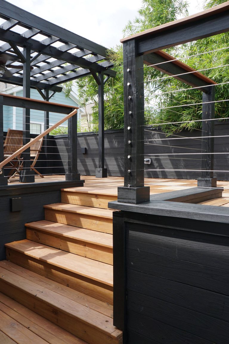 The roof deck reclaimed the outdoor space needed for the addition and provided new views for a client quickly being surrounded by tall, modern townhouses.