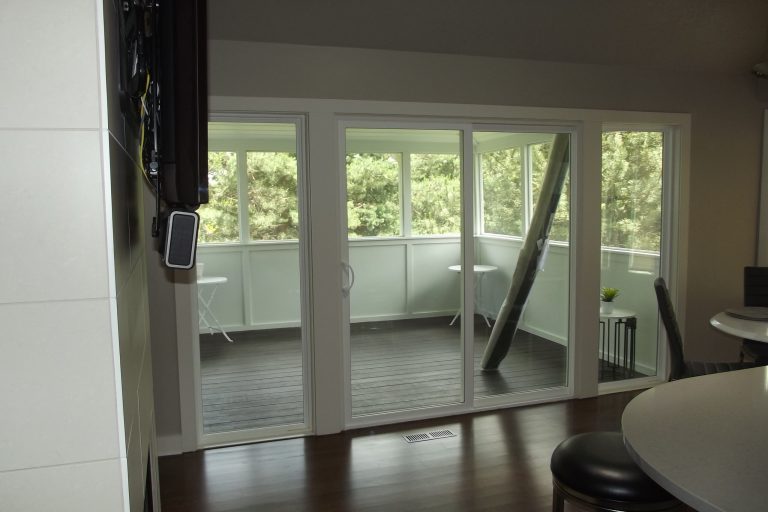 The space was changed from one small door into a large sliding doo and big side windows. Opening up the space and increasing the usability of the porch. by Morgan Wightman Supply Co | Outdoor Photos | Porch | Landscaping | Landscape Design | Outdoor Living Space | Porch Design Ideas | Outdoor Living Space Ideas | Backyard Design