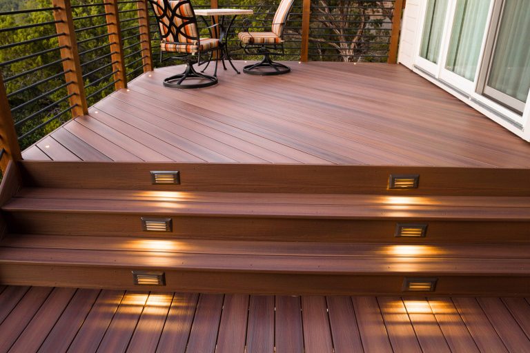 The step lighting and LEDs around the perimeter allow the homeowners to enjoy their deck day or night. Designed & built by Jim Odom at Archadeck Austin. Photo Credit: Kristian Alveo & TimberTown