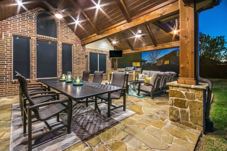 The style of the project is hill country with the cedar wrapped beams, dark tongue and groove