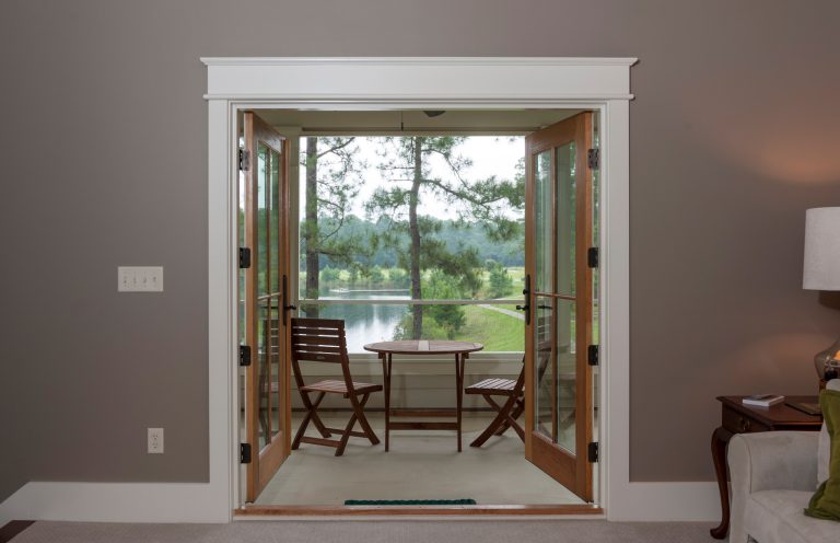 The upstairs screened porch is a bonus for the master bedroom. Porches are much desired Southern homes. With the view, this space will be used often, for reading, drinking coffee and just relaxing. by Coastal Signature Homes | Outdoor Photos | Porch | Landscaping | Landscape Design | Outdoor Living Space | Porch Design Ideas | Outdoor Living Space Ideas | Backyard Design