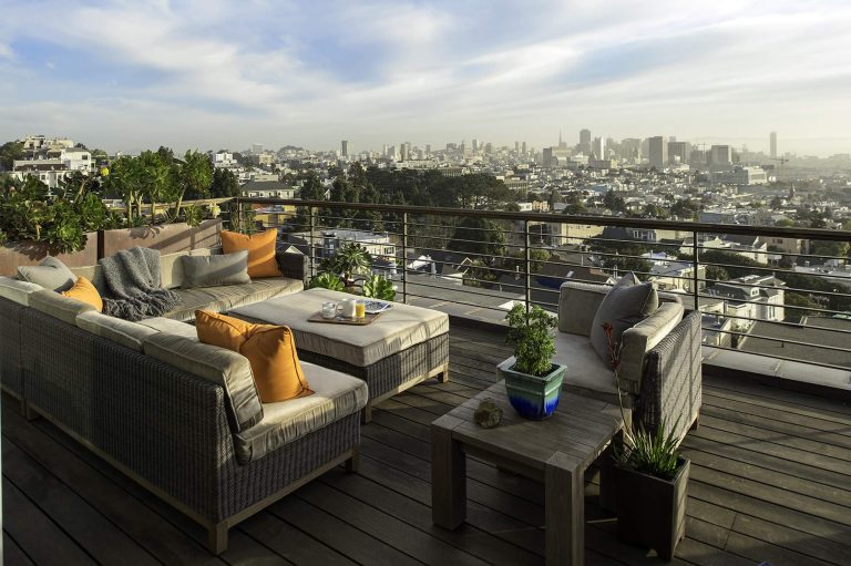 The vast view from this cozy deck allows for scenes of almost the entire city. There's a sense of being awestruck while also comfortable in this very tall verticle perch. Photo cred: Nick Novelli