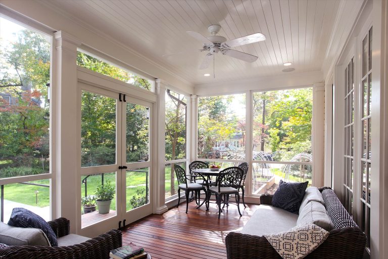 The view from the screen porch to the street. Photography - Marc Anthony PhotographyMid-sized arts and crafts screened-in side porch photo in DC Metro with decking and a roof extension by Wiedemann Architects LLC | Outdoor Photos | Porch | Landscaping | Landscape Design | Outdoor Living Space | Porch Design Ideas | Outdoor Living Space Ideas | Backyard Design