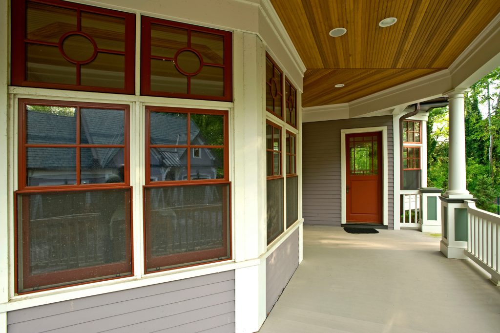 The wrap around covered porch at the front of the house.